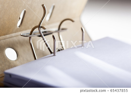 Opened archive ring binder Opened archive ring binder 65437855