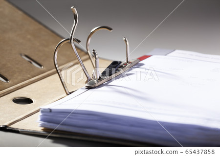 Opened archive ring binder 65437858