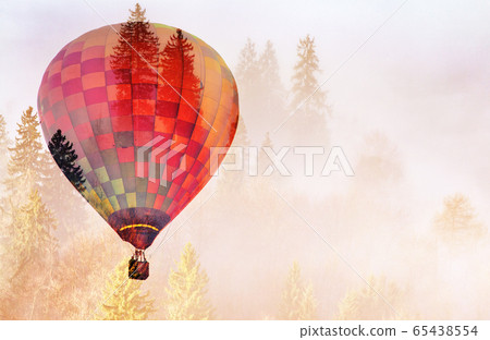 double exposure of hot air balloon and foggy 65438554