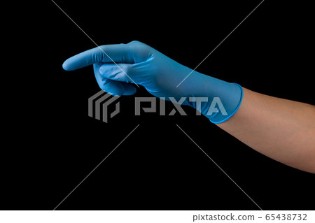 Doctor's hand in medical gloves touching screen by finger isolated on black Doctor's hand in medical gloves touching screen by finger isolated on black 65438732