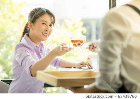 Young pretty woman cafe drink drink clerk person material Young pretty woman cafe drink drink clerk person material 65439760