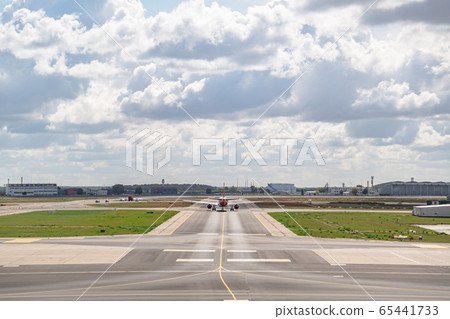 Plane low-cost drives up to airport building Plane low-cost drives up to airport building 65441733