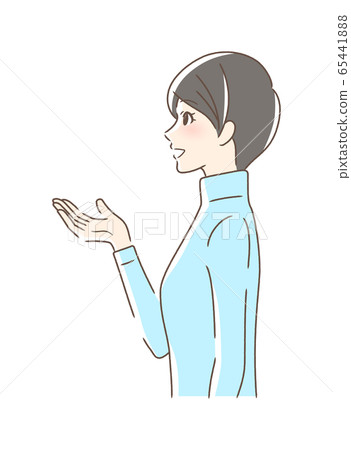Side profile of a woman smiling and holding out her hand 65441888