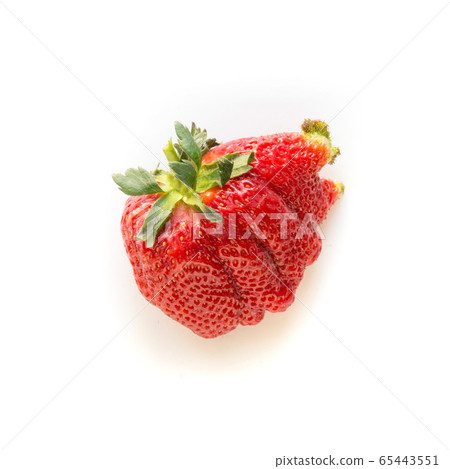 Ugly one ripe organic strawberry isolated on white Ugly one ripe organic strawberry isolated on white 65443551