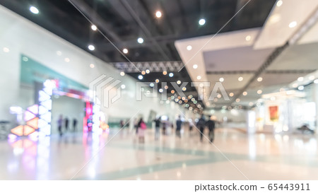 Exhibition event convention hall business blur background of tech expo, trade fair, passenger terminal or museum gallery lobby with blurry interior large corridor hallway white room empty space Exhibition event convention hall business blur background of tech expo, trade fair, passenger terminal or museum gallery lobby with blurry interior large corridor hallway white room empty space 65443911