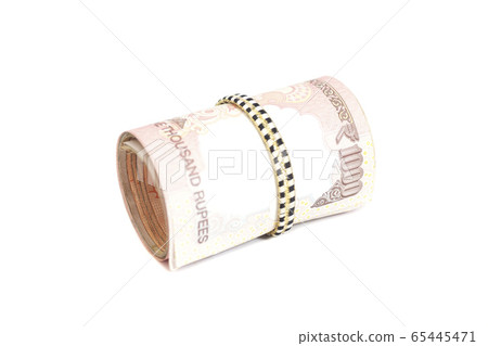 Roll of Indian rupees isolated on white 65445471