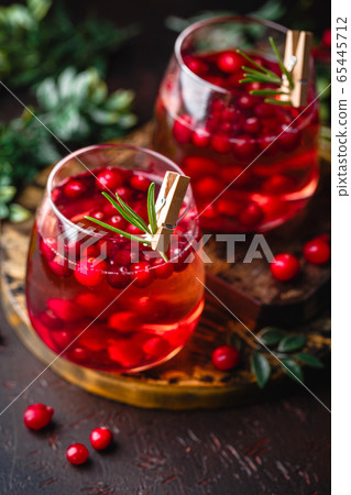 Red cockatil with ice, cranberry and rosemary on Red cockatil with ice, cranberry and rosemary on 65445712