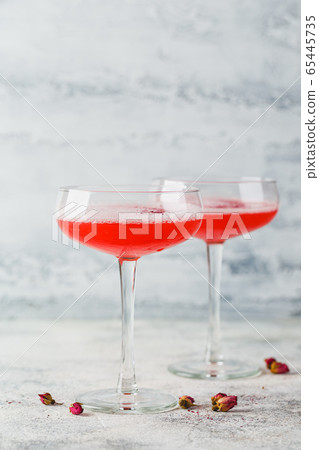 Pink Raspberry Cocktail in drink glass Pink Raspberry Cocktail in drink glass 65445735