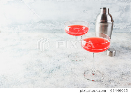 Pink Raspberry Cocktail in drink glass Pink Raspberry Cocktail in drink glass 65446025