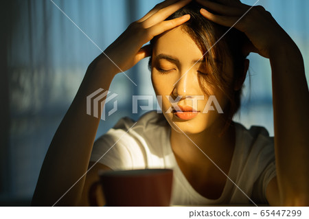 A woman at home 65447299