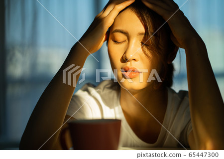 A woman at home 65447300