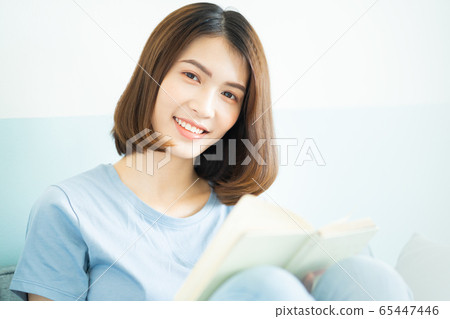 A beautiful woman at home A beautiful woman at home 65447446