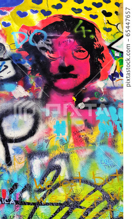 Detail of the famous John Lennon's wall with graffiti in Prague Detail of the famous John Lennon's wall with graffiti in Prague 65447657