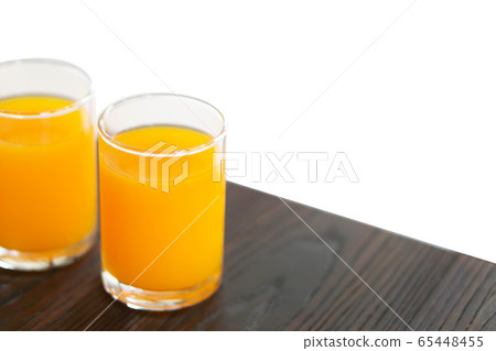 Closeup orange juice on wood table, drink Closeup orange juice on wood table, drink 65448455