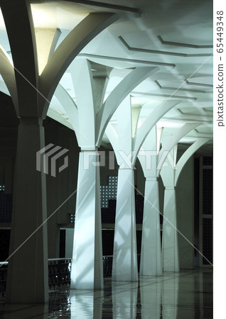 SARAWAK, MALAYSIA -OCTOBER 14, 2014: The interior of Sarawak State Mosque. The mosque has one big main prayer hall covered with one big and beautiful dome and supported with other small domes.  65449348