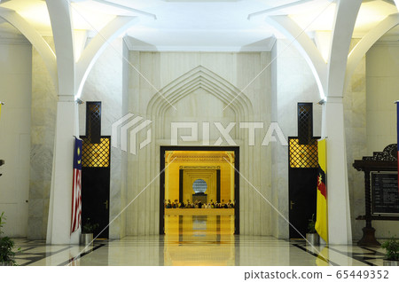 SARAWAK, MALAYSIA -OCTOBER 14, 2014: The interior of Sarawak State Mosque. The mosque has one big main prayer hall covered with one big and beautiful dome and supported with other small domes.  65449352