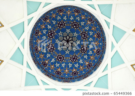 SARAWAK, MALAYSIA -OCTOBER 14, 2014: The interior of Sarawak State Mosque. The mosque has one big main prayer hall covered with one big and beautiful dome and supported with other small domes.  65449366