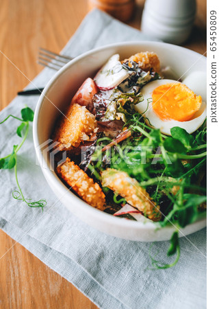 Fresh vegetarian salad with falafel. 65450809