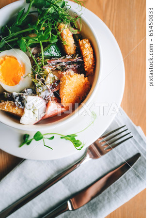 Fresh vegetarian salad with falafel. 65450833