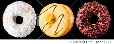 Set of glazed donuts with sprinkles on a black background 65451745