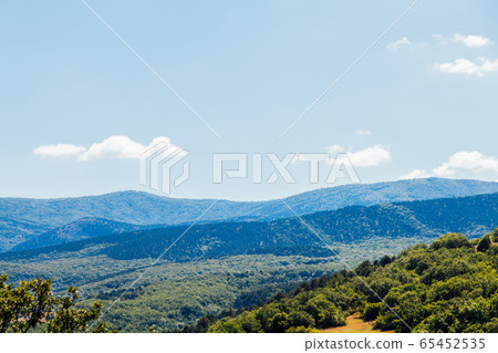 beautiful landscape green forest mountains blue sky 65452535