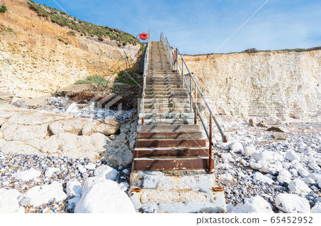 Staircase in Hope Gap beach, UK 65452952