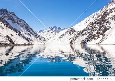 ski in chile on a sunny day with lots of snow. ski in chile on a sunny day with lots of snow. 65453300