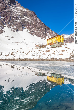 ski in chile on a sunny day with lots of snow. ski in chile on a sunny day with lots of snow. 65453303