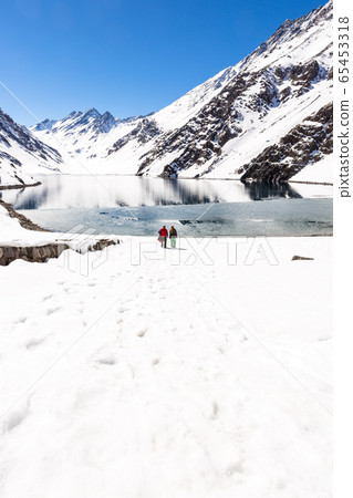 ski in chile on a sunny day with lots of snow. ski in chile on a sunny day with lots of snow. 65453318