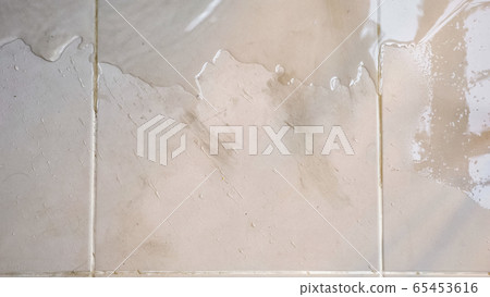 transparent water spreads across floor white tile transparent water spreads across floor white tile 65453616
