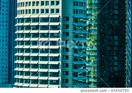 Beautiful architecture building exterior window pattern for background 65454793