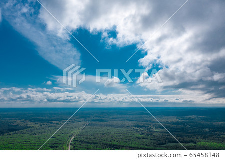 Huge forest open spaces with the sky above them. View from above Huge forest open spaces with the sky above them. View from above 65458148
