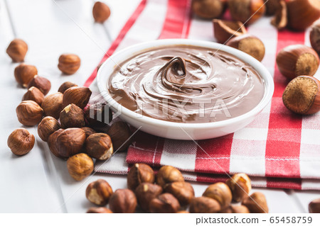 Sweet hazelnut spread. Chocolate cream. Sweet hazelnut spread. Chocolate cream. 65458759