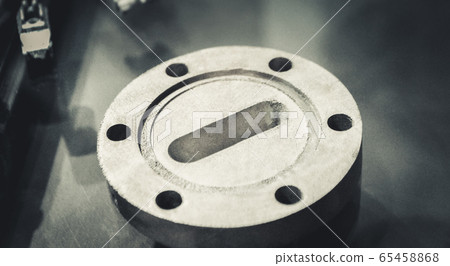 Object printed on metal 3d printer close-up. Object printed on metal 3d printer close-up. 65458868