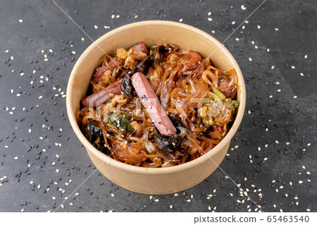 Stir fry noodle with chicken in a wok pan Stir fry noodle with chicken in a wok pan 65463540