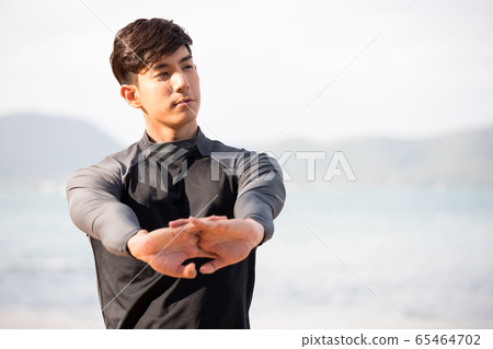 Young men training outdoors Young men training outdoors 65464702