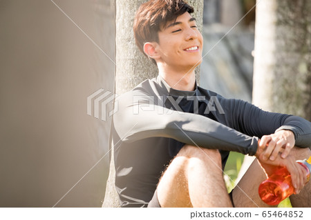 Young men training outdoors 65464852