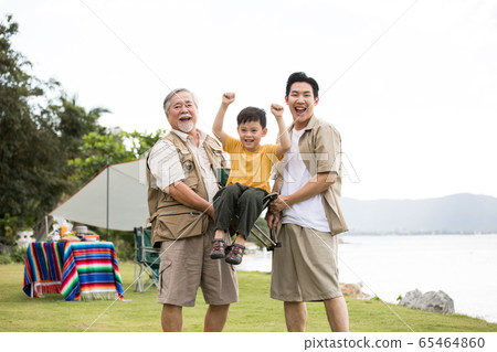 Three generations of families enjoying the outdoors Three generations of families enjoying the outdoors 65464860