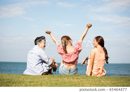 Male and female friends enjoying a resort trip 65464877