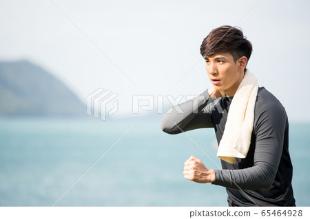 Young men training outdoors Young men training outdoors 65464928