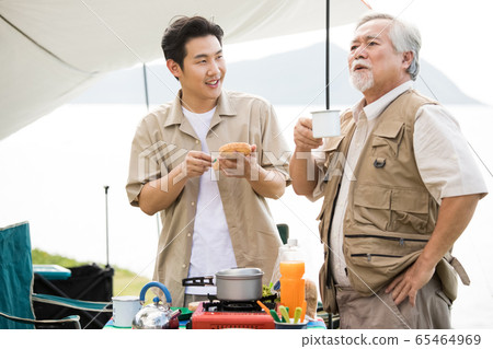 Senior men and young men enjoying the outdoors Senior men and young men enjoying the outdoors 65464969