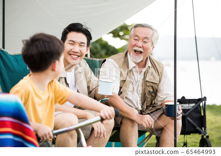 Three generations of families enjoying the outdoors Three generations of families enjoying the outdoors 65464993