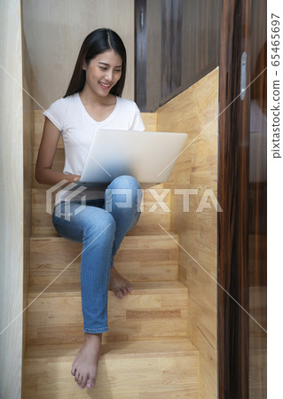 Asian girl work office job from home between 65465697