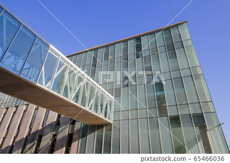 Modern glass office building of national statistics institute and the bridge to Executive Tower, Montevideo, Uruguay 65466036