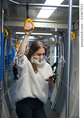 Girl in a subway car Girl in a subway car 65467833