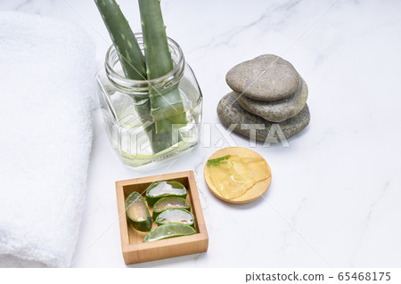Aloe vera pieces for skin treatment. 65468175
