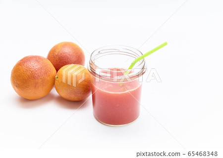 Jar of homemade red orange juice 65468348