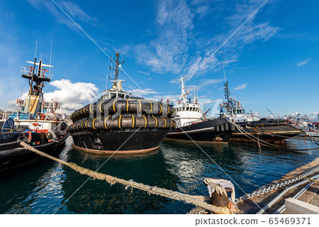 Four tugboats moored in the port of La Spezia Italy Four tugboats moored in the port of La Spezia Italy 65469371