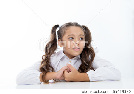 knowledge day. small girl child in school at knowledge day. small girl child in school at 65469380