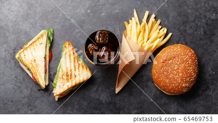 Club sandwich, potato fries chips and cola 65469753